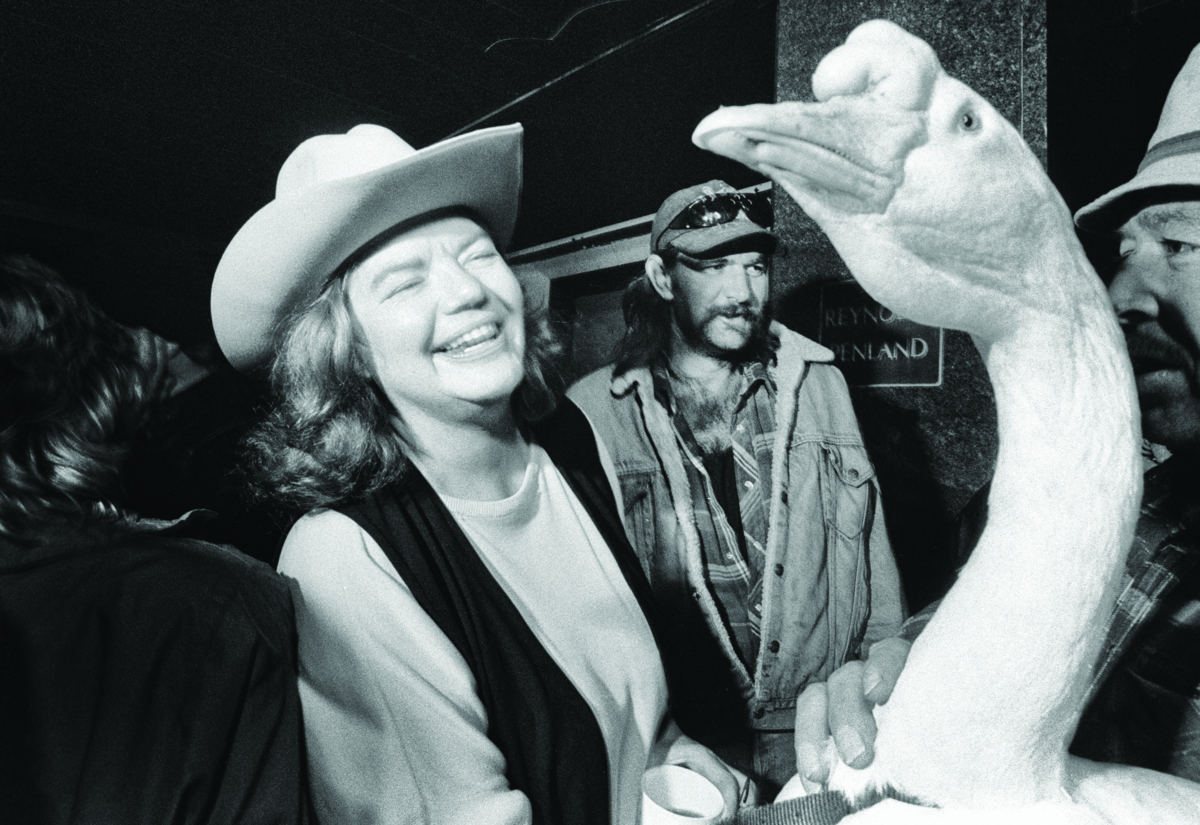 Former Texas Observer editor Molly Ivins, who camped out in protest of Austin’s camping ban in 1996, greets Homer the Homeless Goose, a waterfowl who played a key role in the protests of the Street People’s Advisory Committee.