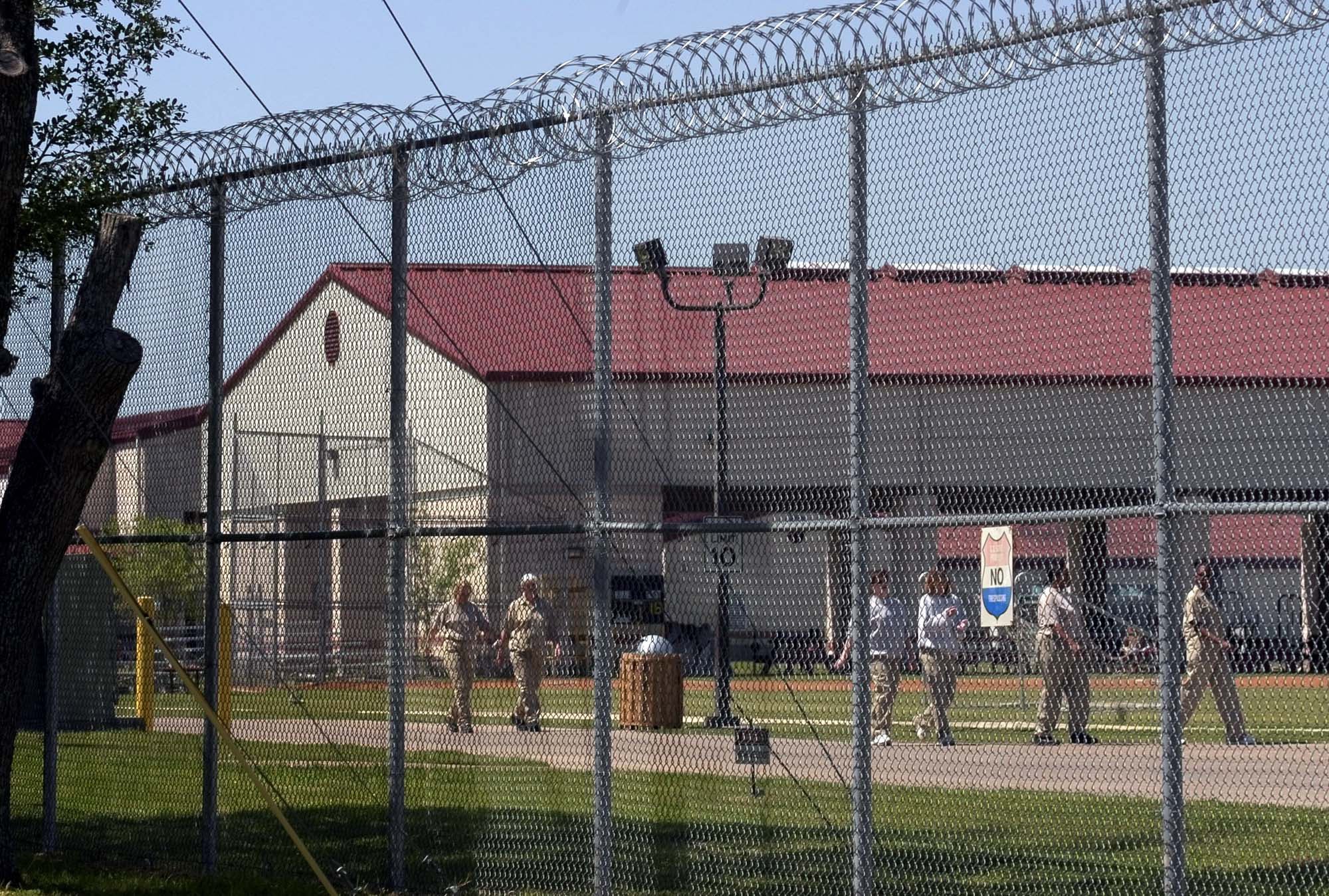 Inmates return from lunch at the Bryan federal prison camp Thursday, April 1, 2004, in Bryan, Texas. The minimum security women's facility is where Lea Fastow, the wife of former Enron Corp. finance chief Andrew Fastow, who pleaded guilty in January to a tax crime for helping her husband hide illicit income from one of his many shady deals, is likely to serve her time. (AP Photo/Pat Sullivan)