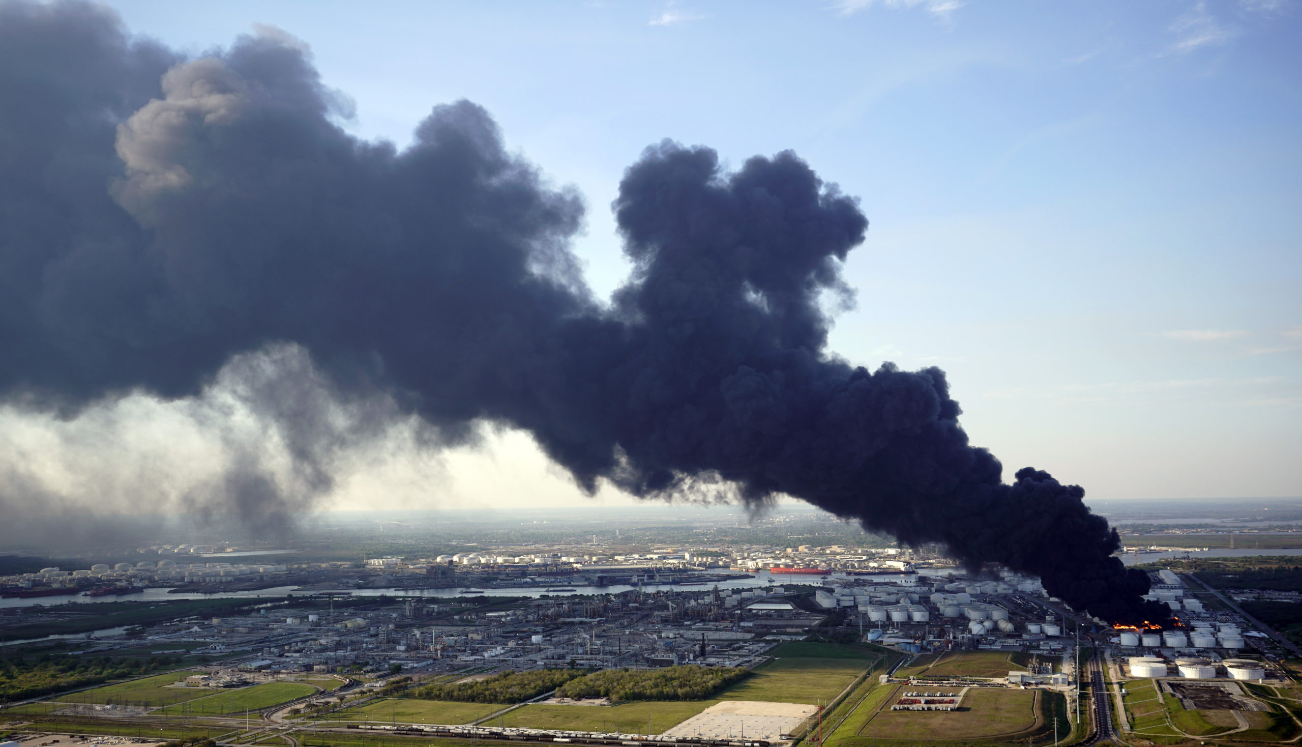 In this March 18, 2019 file photo, a plume of smoke rises from a petrochemical fire at the Intercontinental Terminals Company in Deer Park, Texas. (AP Photo/David J. Phillip, File)