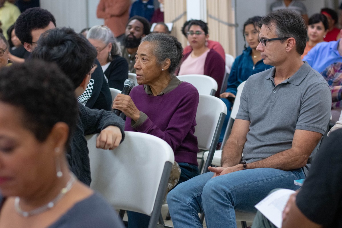 Community members speak at a coalition meeting in January 2020.
