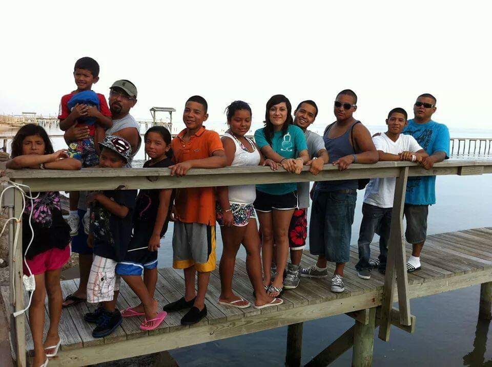 Ricky Hernandez (third from the right) with his brother Henry (fourth from the right) and other family members. Ricky Hernandez took his own life at the Coffield Unit on May 22.