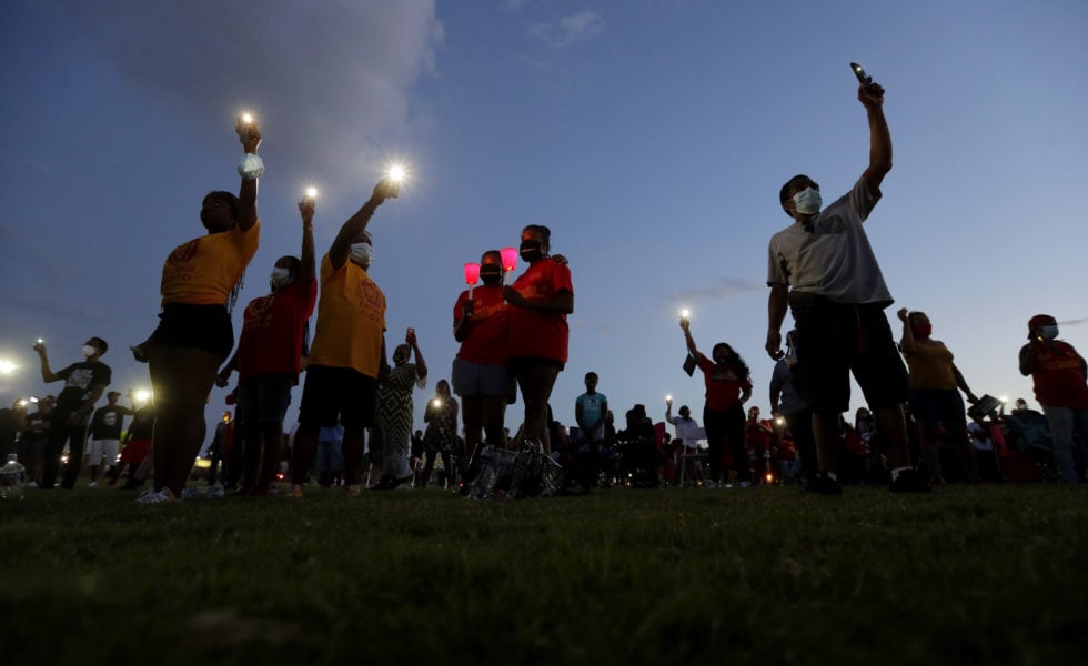 On Monday, June 8, 2020, local residents and alumni of Jack Yates High School take part in a candlelight vigil to honor George Floyd, in Houston. The “George Floyd Act” was scheduled to get its first hearing in the Texas Capitol on Thursday, March 25, 2021.