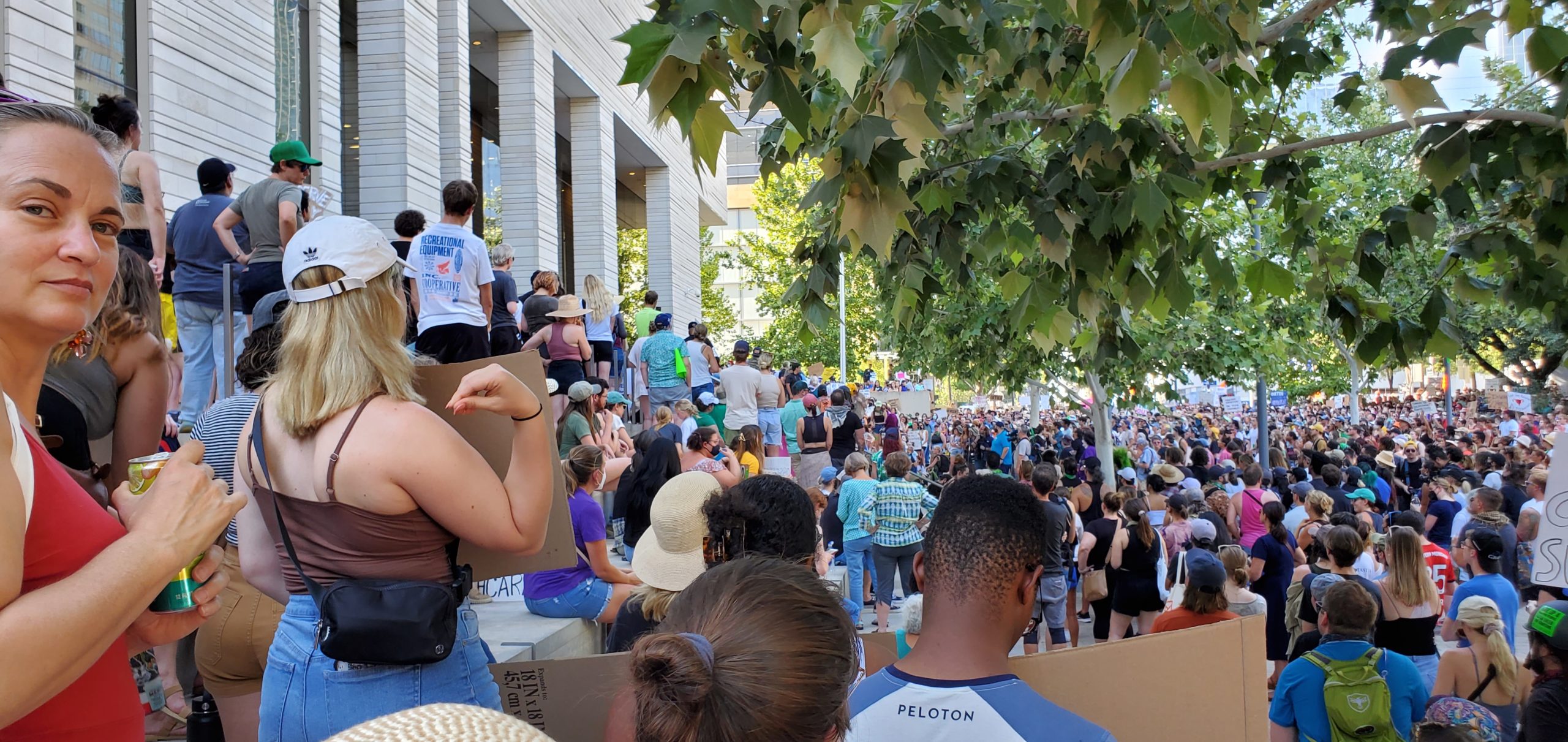 Hundreds of protests throng the steps of the Federal Courthouse in downtown Austin, Texas.