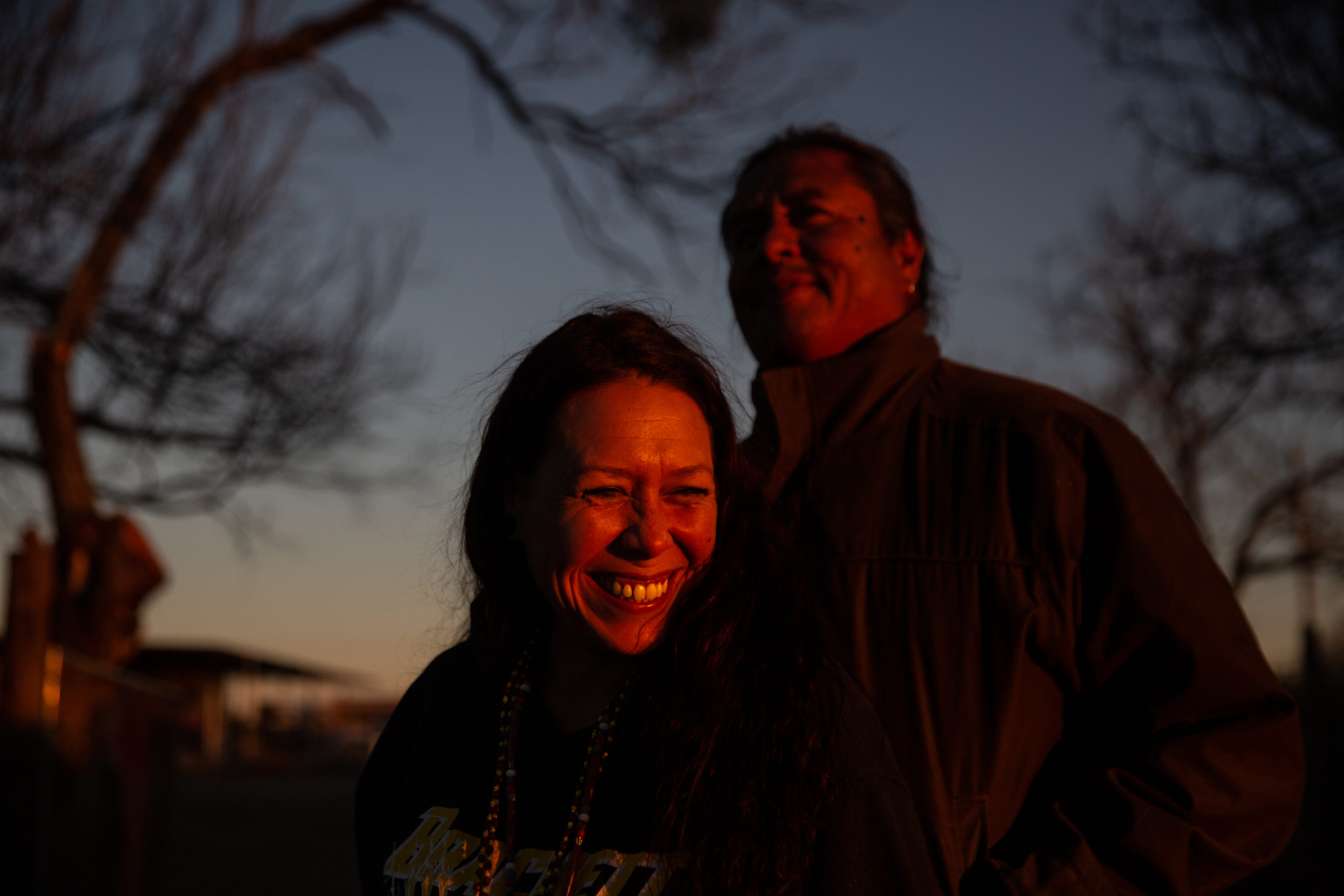 Shawn Alsenay and Mande Davalo enjoy the sunset in Brackettville. The couple often host events at their house to bring members of the Lipan Apache Band of Texas together.
