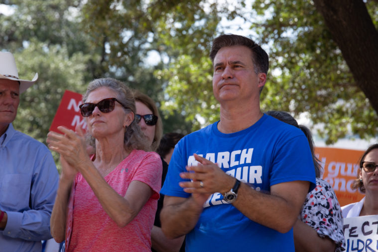 State Senator Roland Gutierrez, state Representative Donna Howard, and state Representative Tracy King listen to speakers.