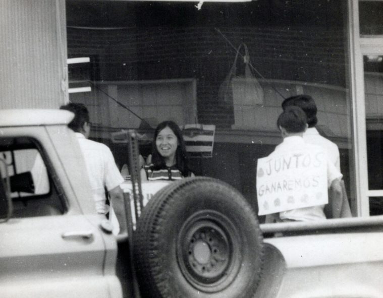 Youthful protesters gather in Uvalde in 1970 near a pickup truck.