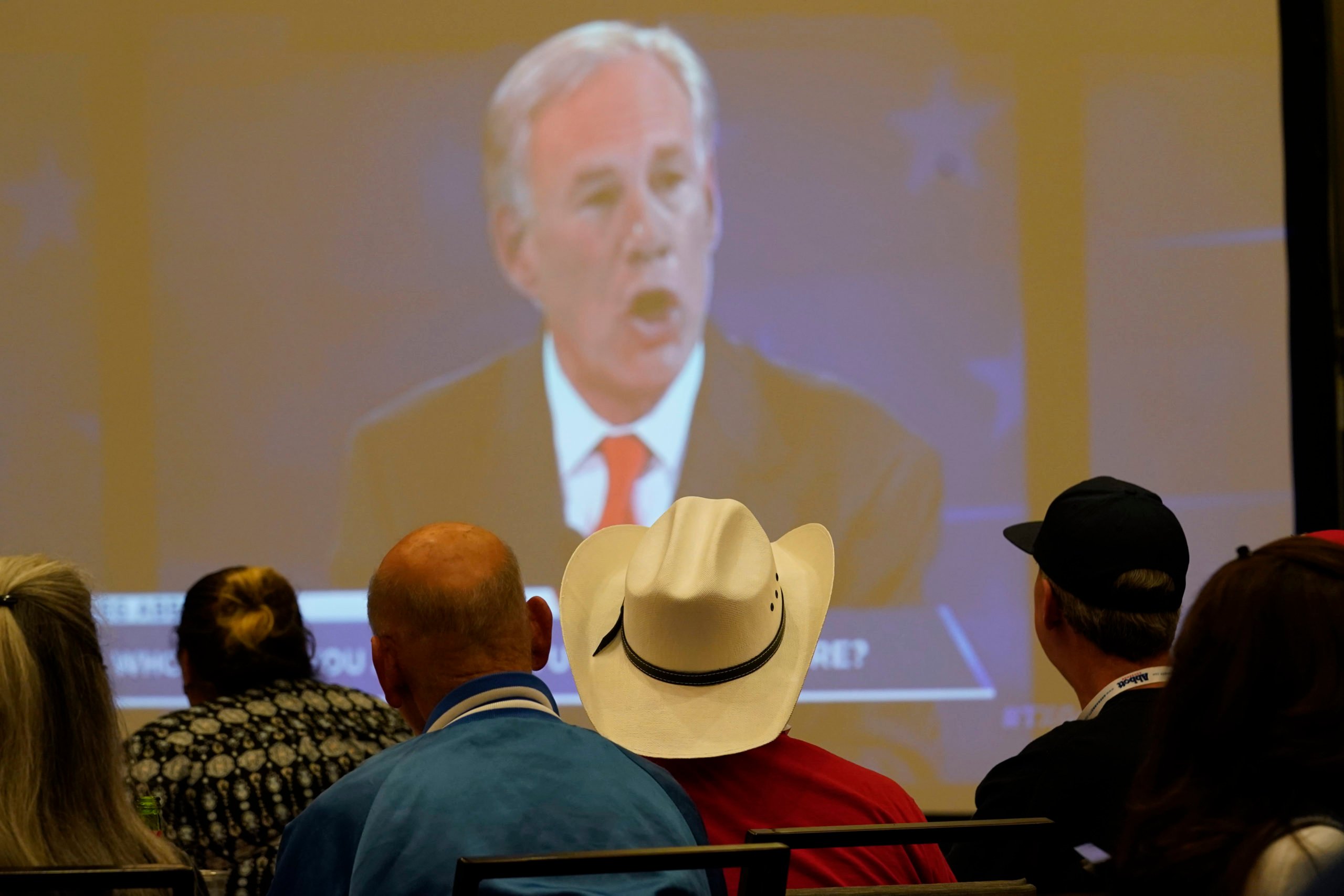 Supporters of Texas Gov. Greg Abbott watch his debate with Texas Democratic gubernatorial candidate Beto O'Rourke.