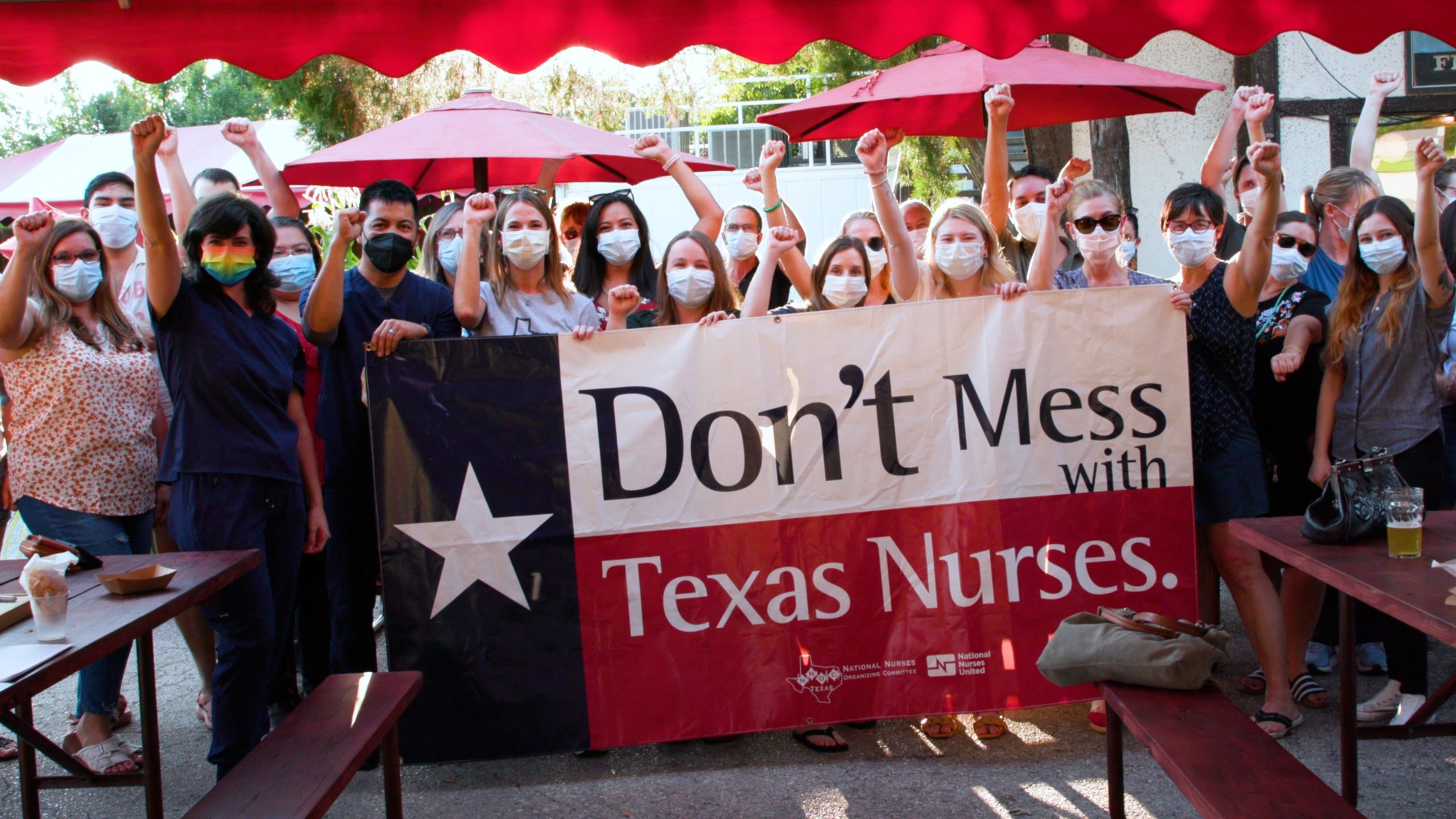National Nurses United with sign, "Don't Mess With Texas Nurses"