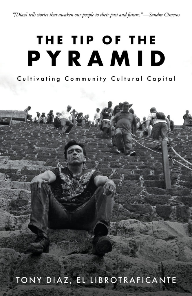 Book cover of "The Tip of the Pyramid:  Cultivating Community Cultural Capital" by Tony Diaz, El Librotraficante