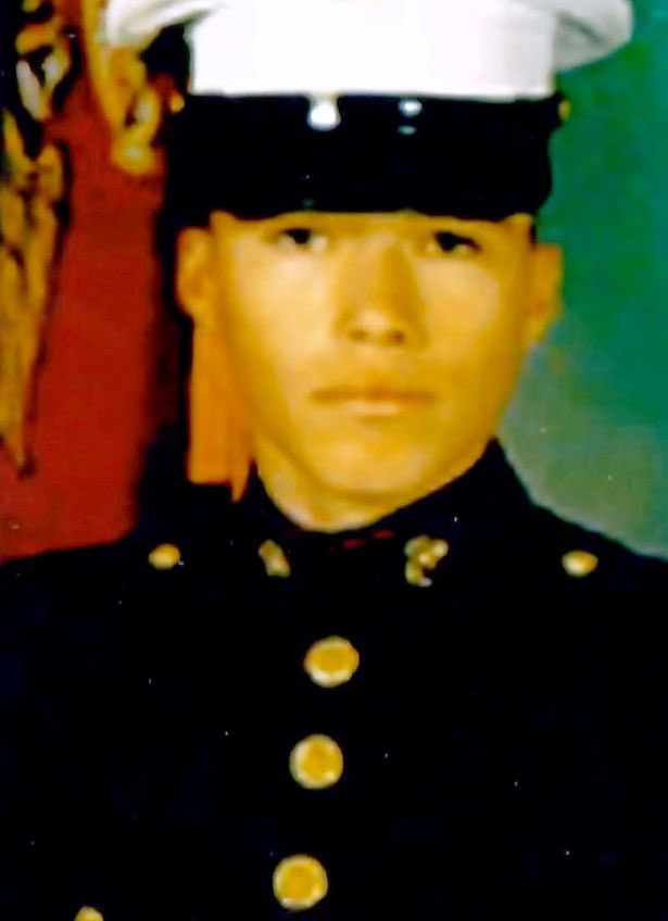 A Marine corp photo of John Ramirez in dress uniform.