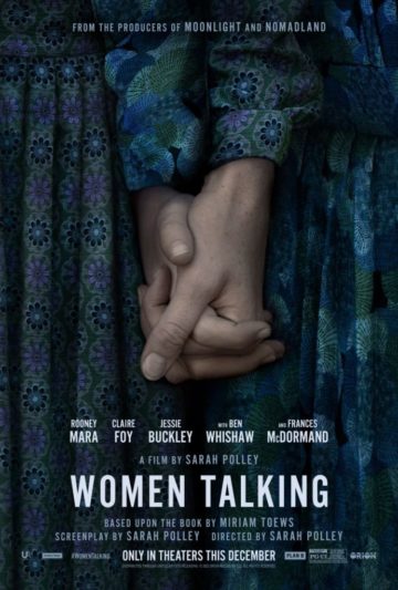 The movie poster for Women Talking shows two women in simple clothing as a closeup of their clasped hands.