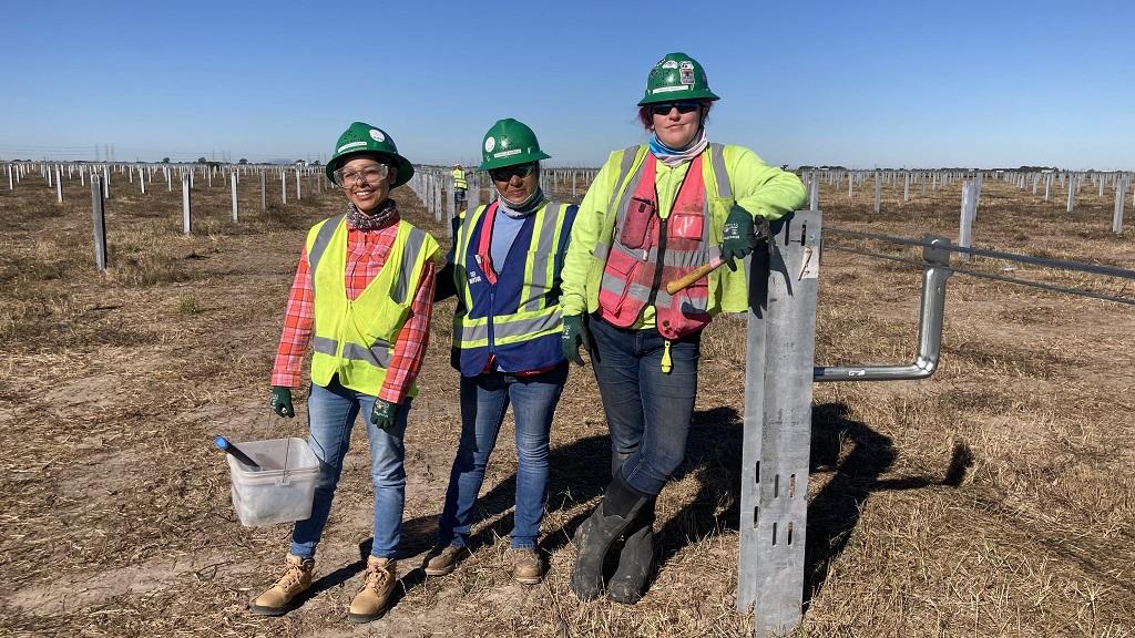 Amanda “Pinkie” Hebert, right, left her job as a Texas correctional officer to work in solar.