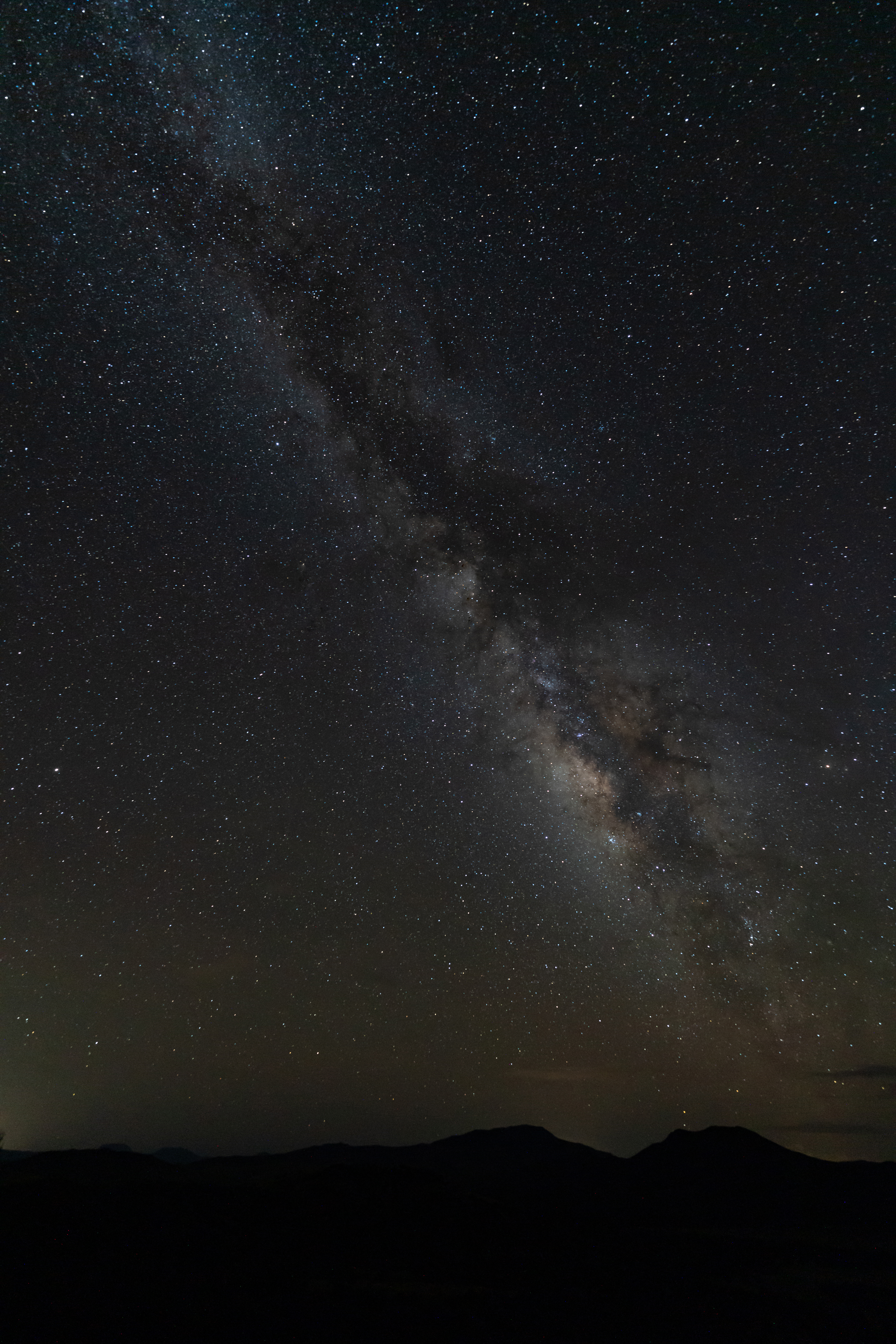 Seen with the naked eye, the skies are intensely full of stars in Limpia Crossing near McDonald Observatory, with the Milky Way like a white river running diagonally across the sky.