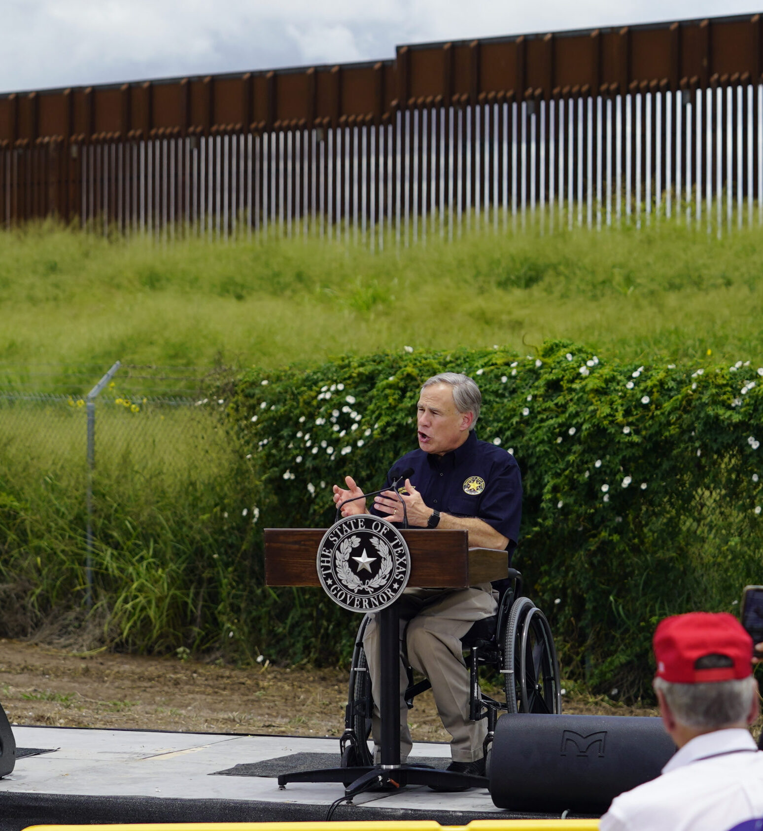 Gov. Greg Abbott, right, visit an unfinished section of border wall, in Pharr, Texas, Wednesday, June 30, 2021. (AP Photo/Eric Gay)