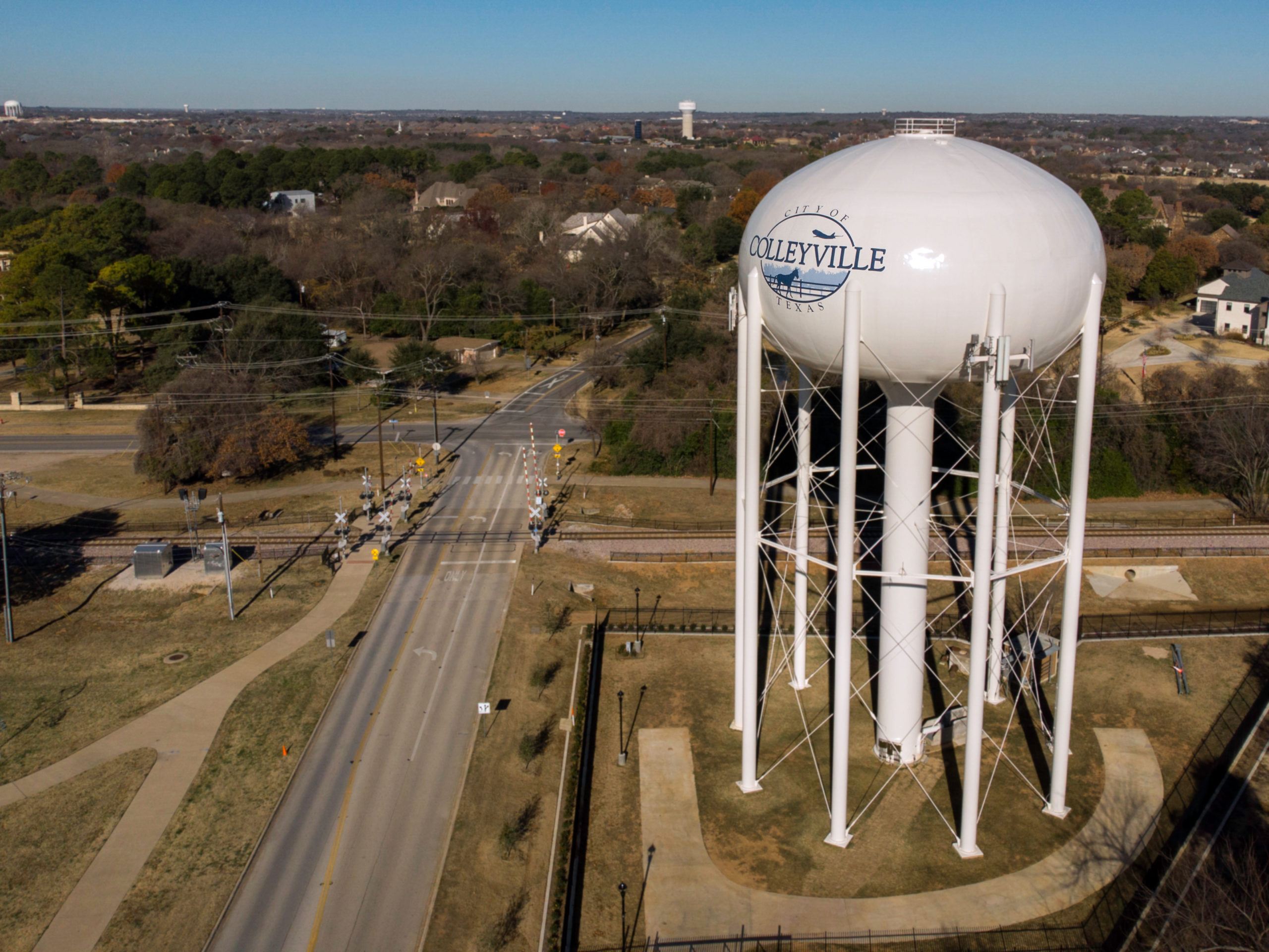 A photo of the Colleyville, Texas water tower, where Bobby Lindamood is now mayor, shot with a shifted focus filter effect to make everything look smaller or toylike.