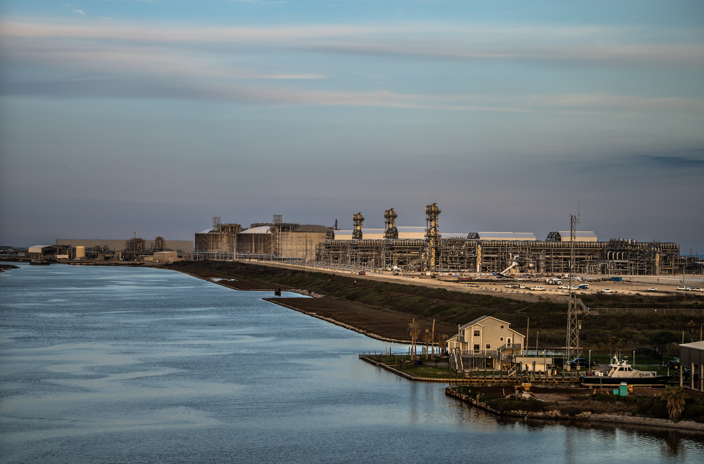 The smokestacks and port terminal at Freeport LNG on the Gulf of Mexico, recently reopened after a massive explosion.