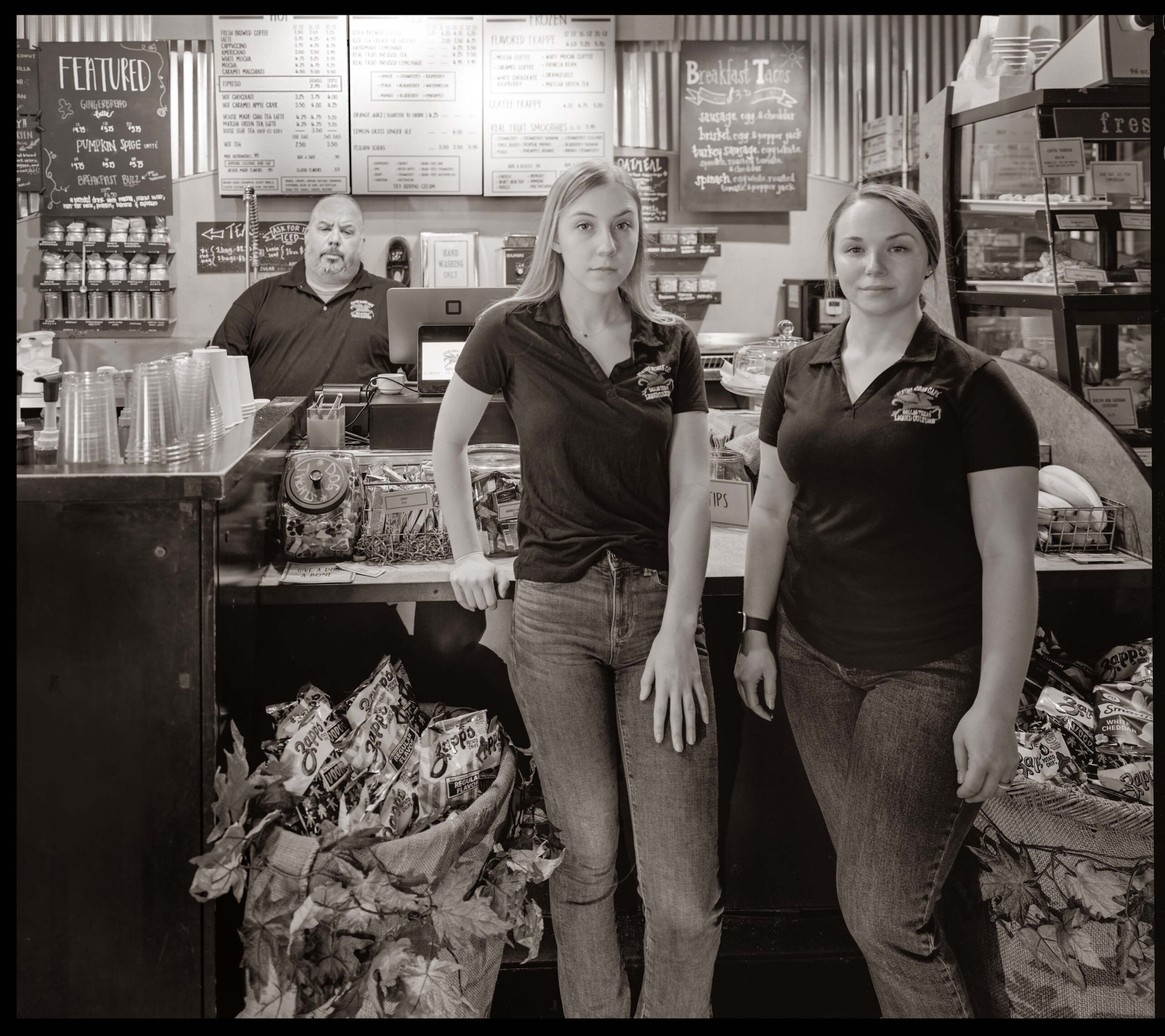 Matt Soness and daughters Brie Soness and Sage Horton start serving coffee at 6 a.m. at downtown Dallas’ Flying Horse Café. 