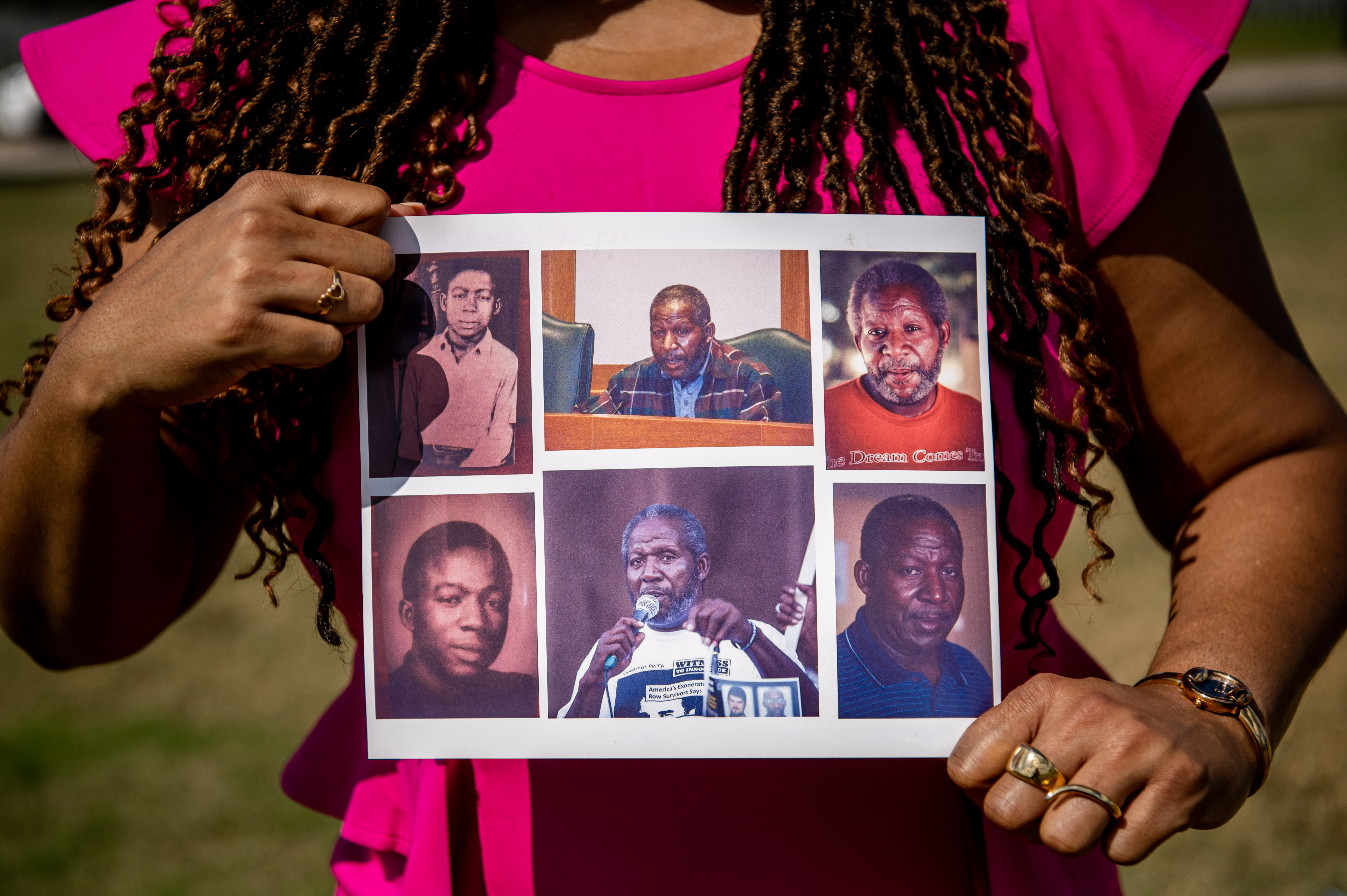 The torso of a Black woman in a pink top, holding a collection of Clarence Brandley images in a rectangular grid. She has rings on her fingers and her hair cascades around her shoulders.