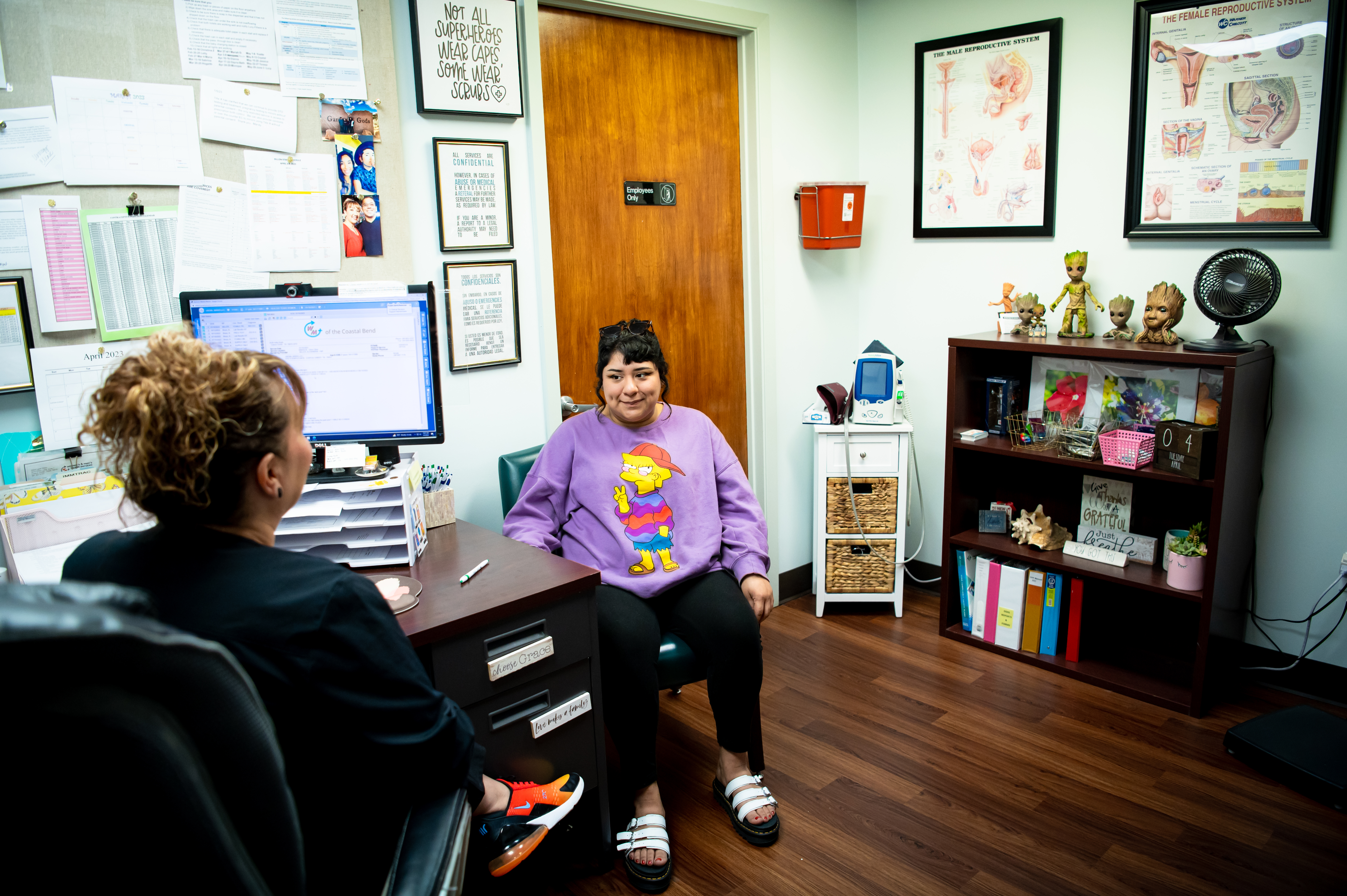 CORPUS CHRISTI, TEXAS - APRIL 4, 2023: Clinic Supervisor, Yvette Herrera, advises Mariella Ureña, 27, about birth control options, during a consultation at Women’s & Men’s Health Services of the Coastal Bend, in Corpus Christi. Ms. Ureña works full-time as a nurse aide - she makes $12/hour and cannot afford to have children, nor to pay for birth control, she said. She is thankful to be eligible for free birth control and health services at the clinic through Healthy Texas Women - the state’s largest safety net program, that serves thousands of women each year. Family planning clinics across the state rely on HTW funding to care for patients who can’t afford core services such as annual exams, STI screenings, HIV testing, contraception, pregnancy testing, cancer screenings, and more. PHOTO: Meridith Kohut for The Texas Observer