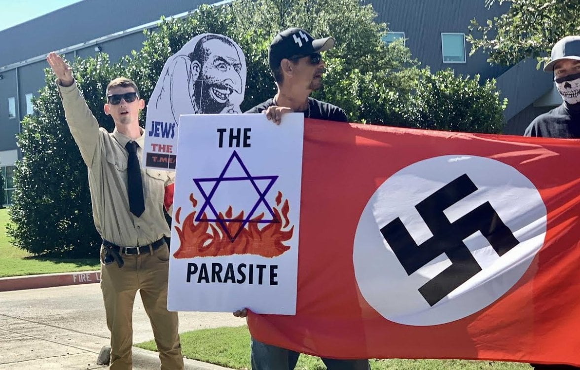 Barry Young (left) with Ronald Murray (right) protesting outside the Cathedral of Hope on October 8