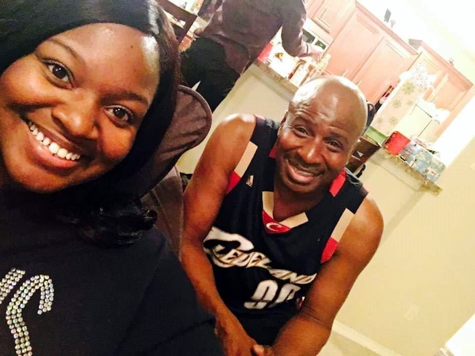 In this photo, Eugene Gates' daughter Shanaye Jones celebrates Christmas with her father in 2017. 